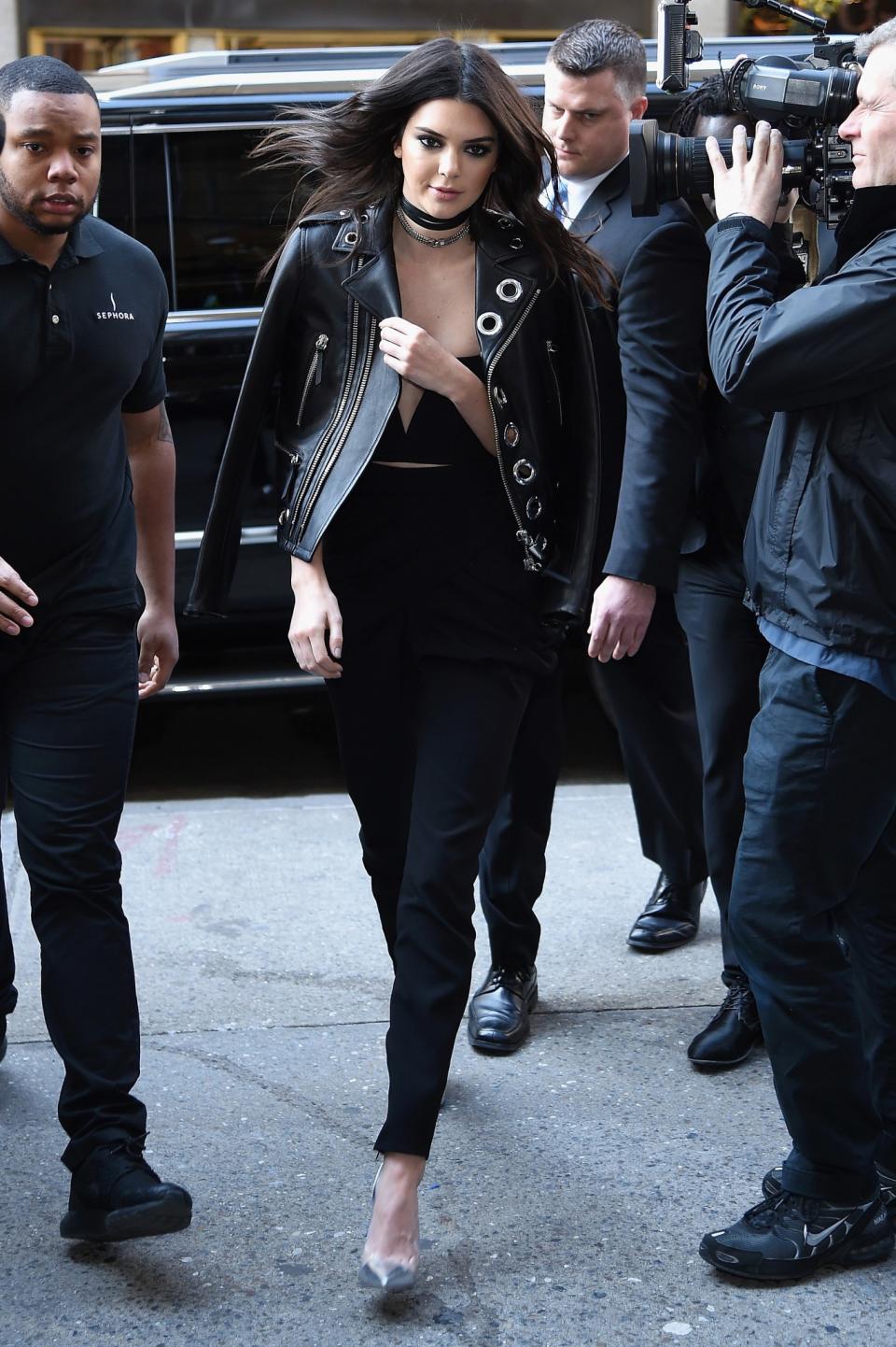 <p>Kendall knows how to perfectly jazz up all black outfit, such as with a studded leather jacket. [Photo: Getty] </p>