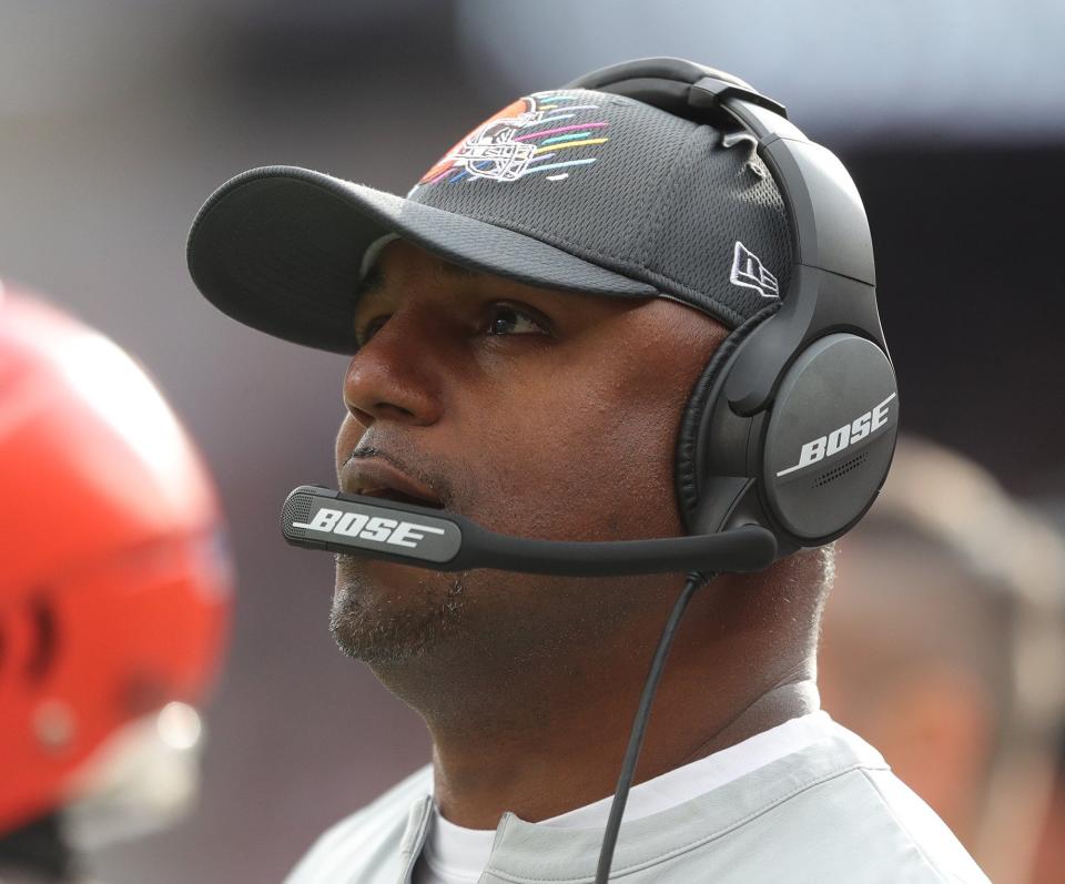 Cleveland Browns defensive coordinator Joe Woods looks to the scoreboard for a replay during the first half of an NFL football game at FirstEnergy Stadium, Sunday, Oct. 17, 2021, in Cleveland, Ohio. [Jeff Lange/Beacon Journal]