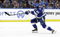 Tampa Bay Lightning right wing Nikita Kucherov (86), of Russia, shoots past Buffalo Sabres goaltender Carter Hutton for a goal during the second period of an NHL hockey game Thursday, Feb. 21, 2019, in Tampa, Fla. (AP Photo/Chris O'Meara)