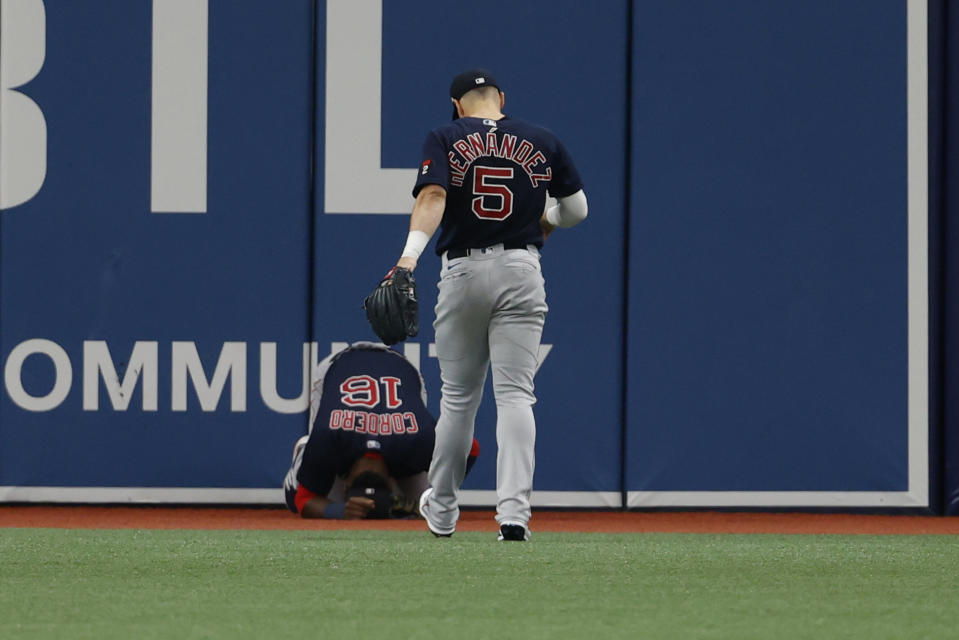 Boston Red Sox center fielder Enrique Hernandez, right, walks toward teammate Franchy Cordero during the fifth inning of a baseball game against the Tampa Bay Rays, Monday, Sept. 5, 2022, in St. Petersburg, Fla. (AP Photo/Scott Audette)