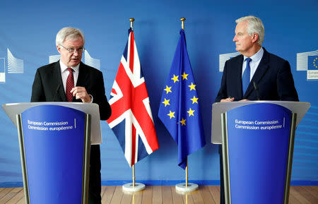 Britain's Secretary of State for Exiting the European Union David Davis (L) and European Union's chief Brexit negotiator Michel Barnier talk to the media, ahead of Brexit talks in Brussels, Belgium September 25, 2017. REUTERS/Francois Lenoir