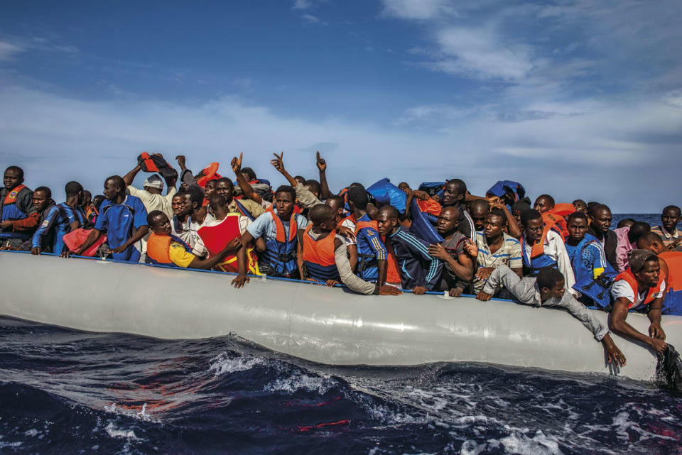 <div class="inline-image__caption"><p>One hundred and nine African refugees from Gambia, Mali, Senegal, Ivory Coast, Guinea, and Nigeria are rescued by the Italian navy from a rubber boat in the sea between Italy and Libya, October 2014.</p></div> <div class="inline-image__credit">Lynsey Addario</div>
