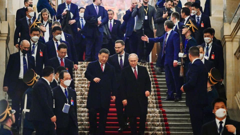 Chinese leader Xi Jinping and Russian President Vladimir Putin leave a reception following talks at the Kremlin in March 2023. - Pavel Byrkin/Spunik/AFP/Getty Images