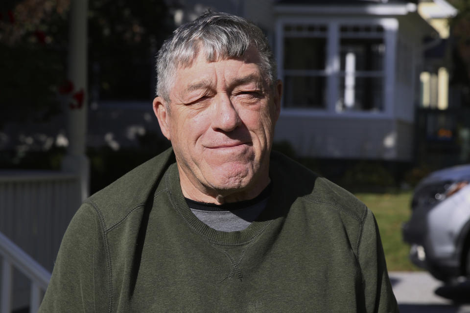 Franklin County write-in sheriff candidate Gail Messier poses outside his home, Monday Oct. 3, 2022, in St. Albans, Vt. Messier, who has had a decades-long career in law enforcement, chose to mount a write-in campaign for Franklin County sheriff after the only listed candidate on the November ballot was fired from his job as a deputy sheriff after he was recorded on video kicking a shackled prisoner. (AP Photo/Wilson Ring)