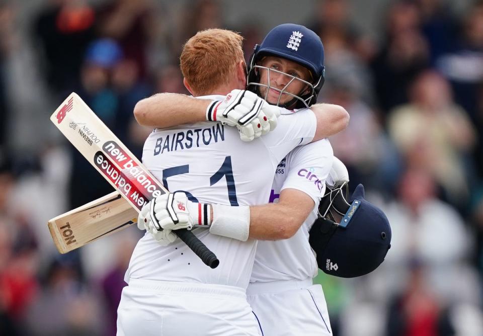 Bairstow (left) and Root celebrate victory (PA)