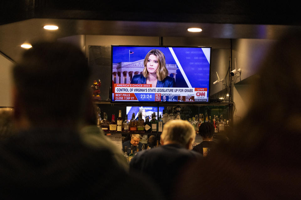 Party goers wait for election results during an election watch party for the race between Monty Mason and Danny Diggs in Senate District 24 at The Corner Pocket in Williamsburg, Va., Tuesday, Nov. 7, 2023. (Billy Schuerman