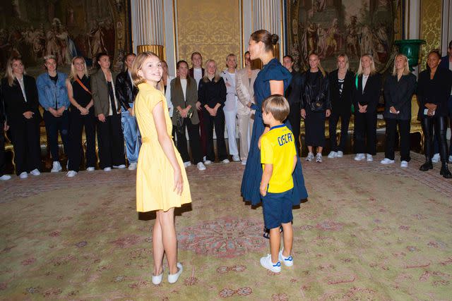 <p>Sipa via AP</p> Crown Princess Victoria, Prince Oscar and Princess Estelle of Sweden attend a reception celebrating the women's national soccer team's bronze World Cup win