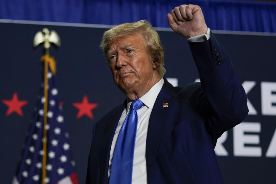 Republican presidential candidate former President Donald Trump gestures after speaking at a campaign rally Monday Oct. 23, 2023, in Derry, N.H. (AP Photo/Charles Krupa)