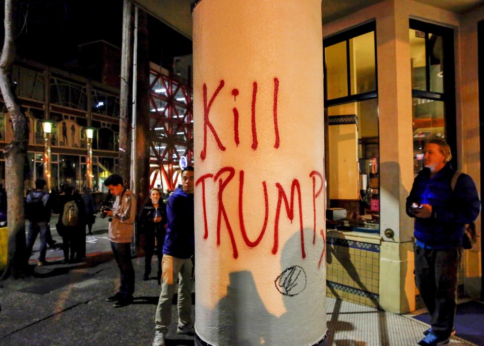 A spray painting reading 'Kill Trump' is seen during a protest at Sproul Hall.&nbsp;