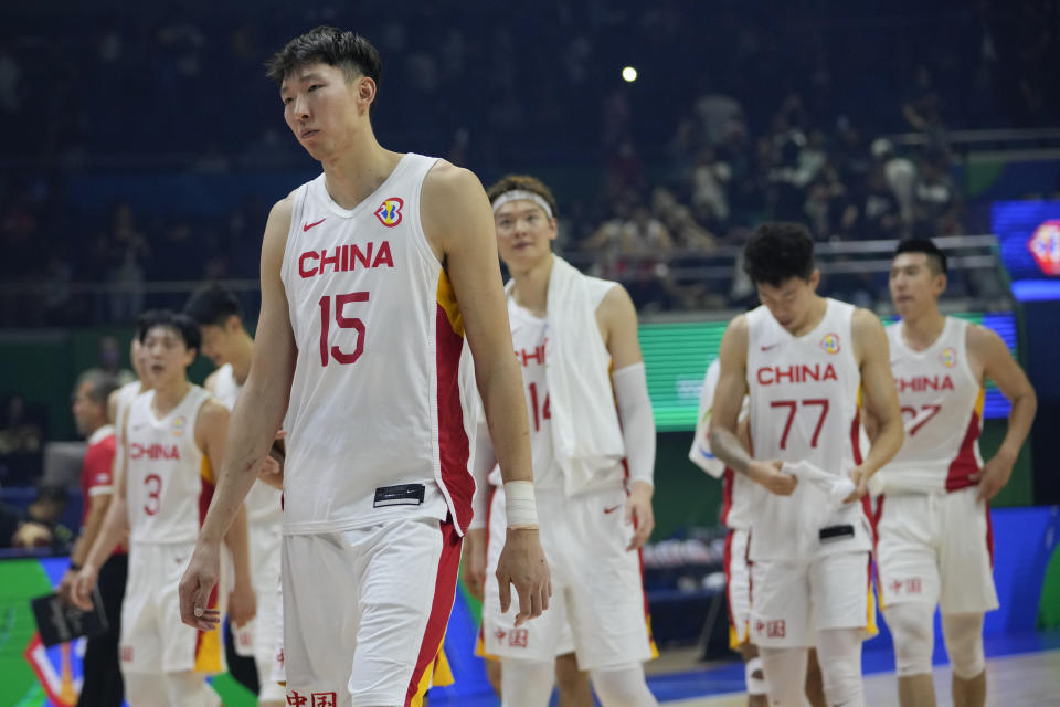 China players walk out of the court after losing against Puerto Rico during their Basketball World Cup group B match at the Araneta Coliseum in Manila, Philippines Wednesday, Aug. 30, 2023. (AP Photo/Aaron Favila)