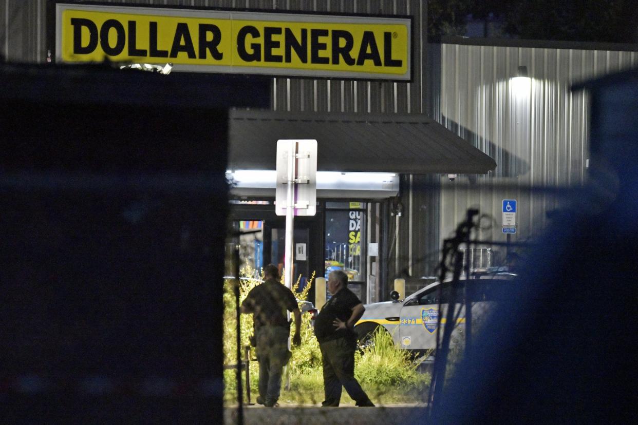 Investigators collect evidence at the Dollar General store on Kings Road in Jacksonville where three people were shot and killed Saturday, Aug. 26, 2023, by a gunman who later took his own life.