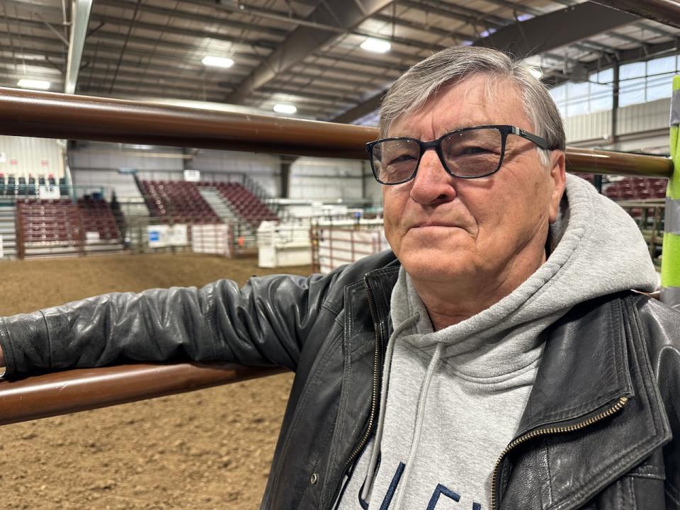 Dennis Grunwald stands just outside the arena before the rodeo kicks off in Medicine Hat April 19, 2024. His favourite event is bull riding. 