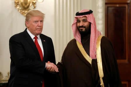 U.S. President Donald Trump and Saudi Deputy Crown Prince and Minister of Defense Mohammed bin Salman meet at the White House in Washington, U.S., March 14, 2017. REUTERS/Kevin Lamarque/Files