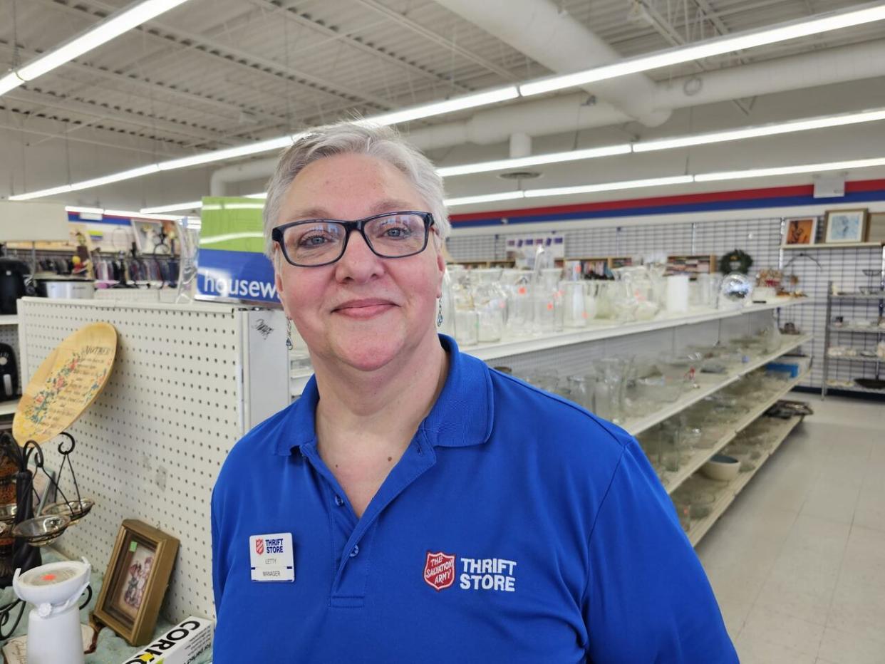 Letty Stone is the manager of the Salvation Army thrift store on Kenmount Road in St. John's. She says demand has increased at the store, but donations are down. (Arlette Lazarenko/CBC - image credit)