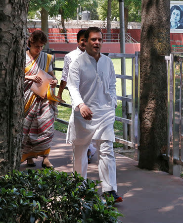 Rahul Gandhi, President of Congress party, arrives with his sister and a leader of the party Priyanka Gandhi Vadra to attend Congress Working Committee (CWC) meeting in New Delhi, May 25, 2019. REUTERS/Altaf Hussain