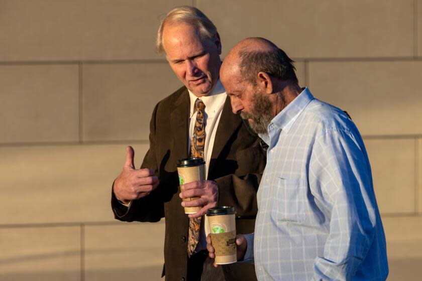 LOS ANGELES, CA - NOVEMBER 03: Defendant Jerry Boylan, right, captain of the Conception dive boat, arrives at Federal Court on Friday, Nov. 3, 2023 in Los Angeles, CA. (Irfan Khan / Los Angeles Times)