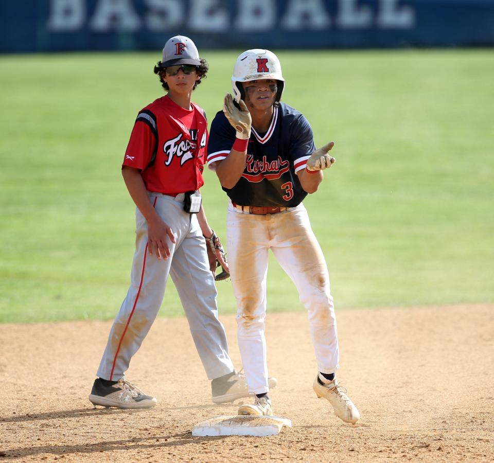 Ketcham's Ben Tullo claps as he makes it safe to second base during Wednesday's Section 1 Class AA quarterfinal versus Fox Lane on May 18, 2022.