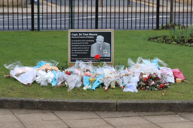 A memorial plaque to Captain Tom