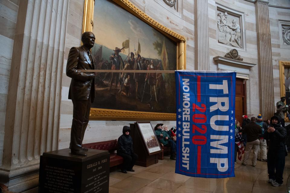Supporters of US President Donald Trump enter the US Capitol's Rotunda on January 6, 2021, in Washington, DC. - Demonstrators breeched security and entered the Capitol as Congress debated the a 2020 presidential election Electoral Vote Certification. (Photo by SAUL LOEB / AFP) (Photo by SAUL LOEB/AFP via Getty Images)