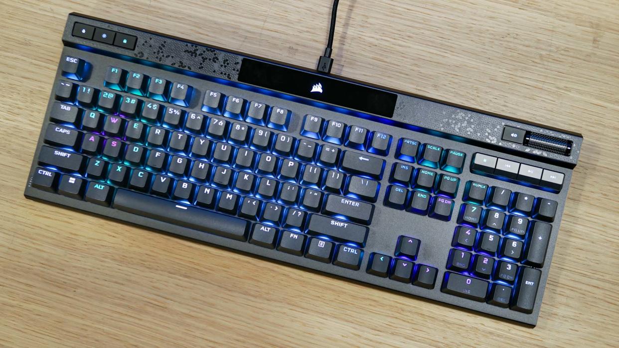  Corsair K70 Max sitting on desk. 