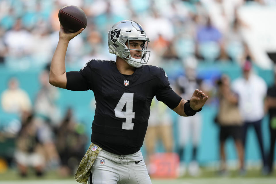 Las Vegas Raiders quarterback Aidan O'Connell (4) aims a pass during the first half of an NFL football game against the Miami Dolphins, Sunday, Nov. 19, 2023, in Miami Gardens, Fla. (AP Photo/Rebecca Blackwell)