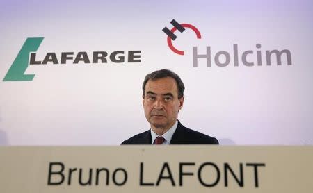 File photo of Lafarge CEO Bruno Lafont, who will become CEO of LafargeHolcim, attends a news conference in Paris, April 7, 2014. REUTERS/Christian Hartmann