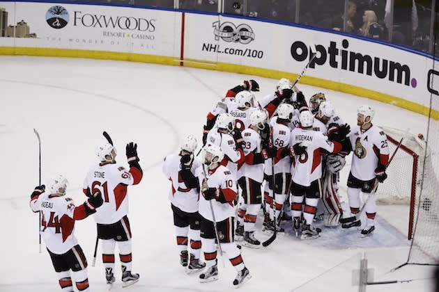 The Ottawa Senators celebrate after Game 6 of an NHL hockey Stanley Cup second-round playoff series against the New York Rangers Tuesday, May 9, 2017, in New York. The Senators won 4-2. (AP Photo/Frank Franklin II)