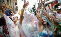 Revellers take part in an annual block party known as "Ceu na Terra" (Heaven on Earth), one of the many carnival parties to take place in the neighbourhoods of Rio de Janeiro, Brazil February 25, 2017. REUTERS/Ricardo Moraes