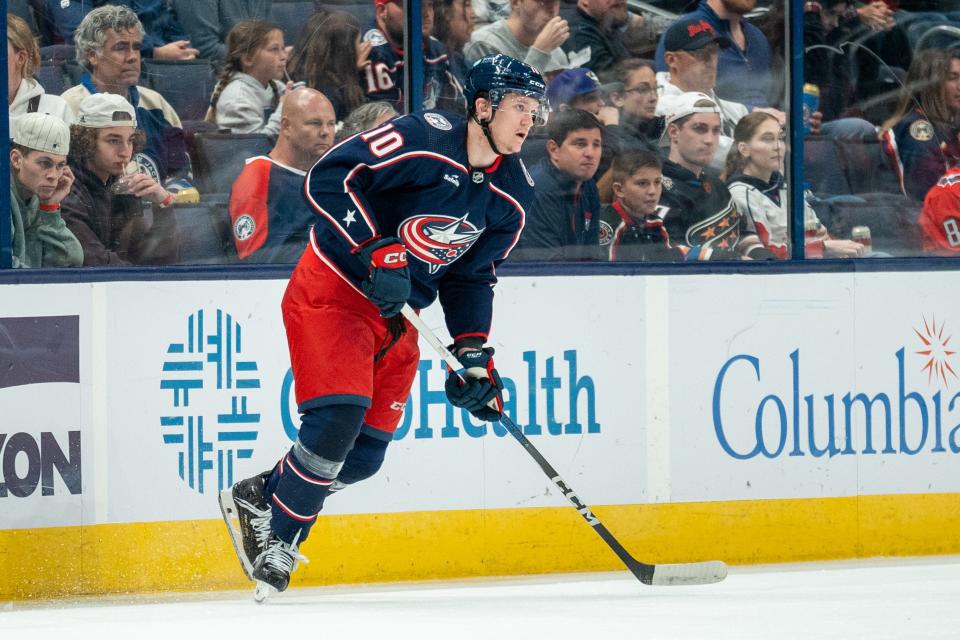 Oct. 5, 2023; Columbus, Ohio, United States;
Columbus Blue Jackets left wing Dmitri Voronkov (10) passes the puck during their game against the Washington Capitals on Thursday, Oct. 5, 2023 at Nationwide Arena.