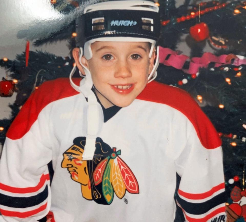 Alan Fuehring, at age 7 on Christmas Day, wearing the Blackhawks jersey his grandparents got for him.