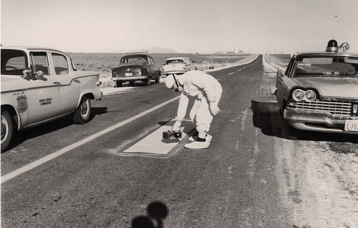 An Idaho nuclear physicist checks U.S. Highway 20 outside of Idaho Falls for contamination on Jan. 4, 1961, one day after the SL-1 accident.