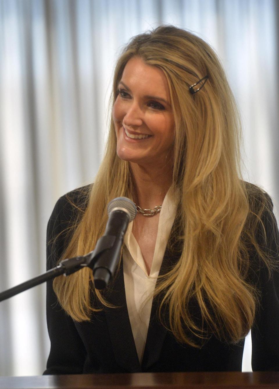 U.S. Sen.-designate Kelly Loeffler, a Republican businesswoman who will soon become Georgia's newest U.S. senator, answers questions at a press conference at the Georgia Ports Authority administrative offices Thursday, Jan. 2, 2020, at the Garden City Terminal in Garden City, Ga. Loeffler, who is scheduled to be sworn in when the Senate convenes Monday, Jan. 7, in Washington, said Thursday she plans to vote against removing President Donald Trump from office. (Steve Bisson/Savannah Morning News via AP)