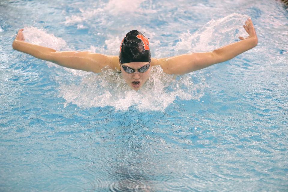 Marlington's Leah Guess swims the 100-yard butterfly to a second-place finish in the Division II Sectional Championships on Friday, Feb. 10, 2023, at the University of Akron.