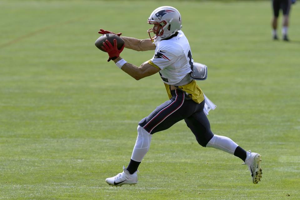 New England Patriots wide receiver Julian Edelman catches a pass during an NFL football training camp practice, Monday, Aug. 24, 2020, in Foxborough, Mass. (AP Photo/Steven Senne, Pool)