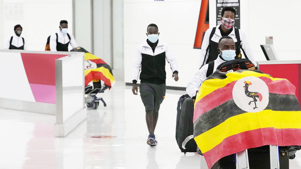 Members of Uganda's Olympic team, pictured here arriving at Narita Airport near Tokyo.