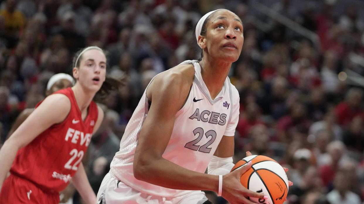 Las Vegas Aces' A'ja Wilson shoots during the second half of a WNBA basketball game against the Indiana Fever, Wednesday, Sept. 11, 2024, in Indianapolis. (AP Photo/Darron Cummings)