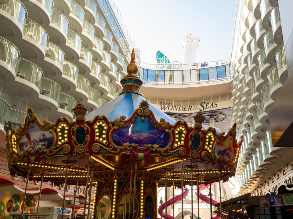 Boardwalk neighborhood on Royal Caribbean's Wonder of the Seas with close up on logo