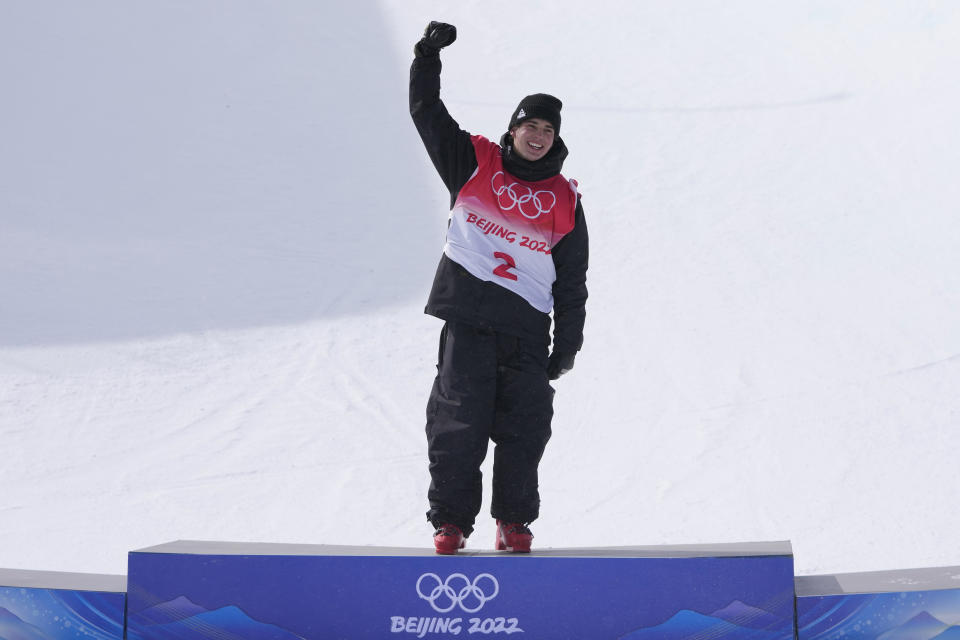 Gold medal winner New Zealand's Nico Porteous celebrates during the venue award ceremony for the men's halfpipe at the 2022 Winter Olympics, Saturday, Feb. 19, 2022, in Zhangjiakou, China. (AP Photo/Lee Jin-man)