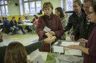 <p>A blind woman and other voters cast a ballot for the Catalan regional election at an elementary school in Barcelona, Spain, Dec. 21, 2017.<br>(Photograph by Jose Colon / MeMo for Yahoo News) </p>