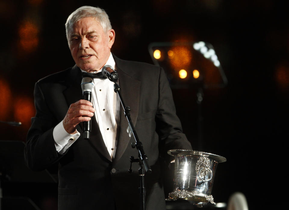 FILE - In this Tuesday Oct. 30, 2012 file photo, Tom T. Hall accepts the Icon Award at the 60th Annual BMI Country Awards in Nashville, Tenn. Singer-songwriter Tom T. Hall, who composed “Harper Valley P.T.A.” and sang about life’s simple joys as country music’s consummate blue collar bard, has died. He was 85. His son, Dean Hall, confirmed the musician's death Friday, Aug. 20, 2021 at his home in Franklin, Tennessee. (Photo by Wade Payne/Invision/AP, File)