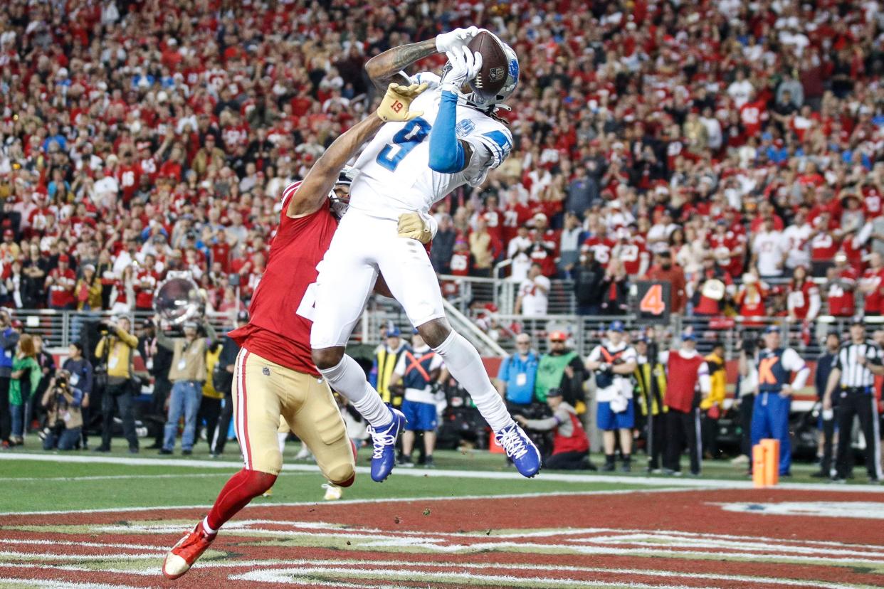Lions wide receiver Jameson Williams makes a catch for a touchdown against 49ers cornerback Deommodore Lenoir during the second half of the Lions' 34-31 loss in the NFC championship game in Santa Clara, California, on Sunday, Jan. 28, 2024.
