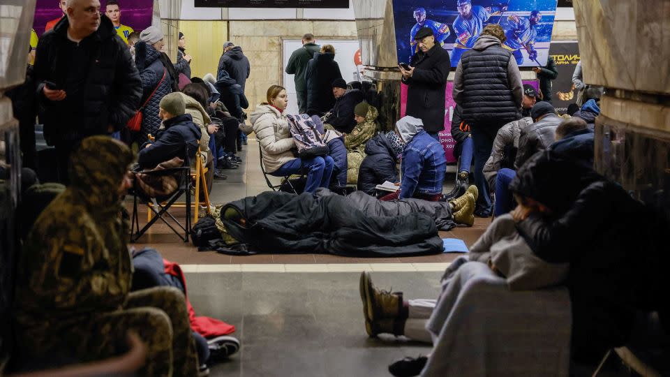 Ukrainians shelter inside a Kyiv metro station during a Russian missile strike on March 21. - Alina Smutko/Reuters