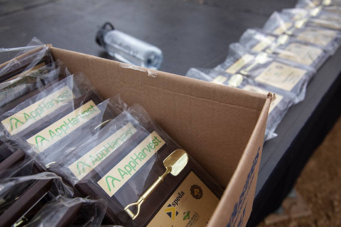 Commemorative plaques sits in plastic wrapping during a groundbreaking ceremony at the site of AppHarvest’s new facility in Sumerset, Ky., Monday, June 21, 2021. The company announced two new facilities today one in, a second facility in Morehead and a 30-acre indoor berry farm in Sumerset. “We cannot build and grow fast enough to meet market demand,” CEO Jonathan Webb said. These two facilities are part of AppHarvest’s goal to have 12 indoor farms by the end of 2025. Construction for both the Somerset and Morehead facility are anticipated to finish by the end of 2022.