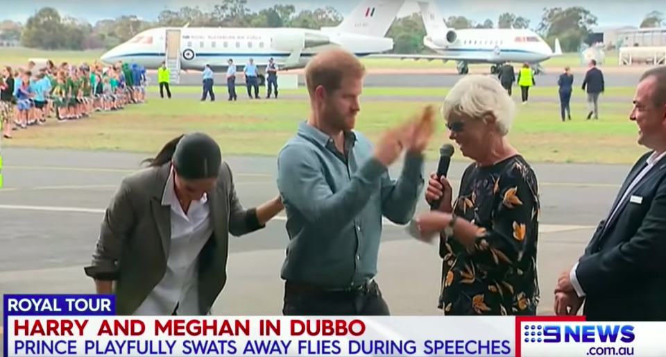 The royal dramatically – and very cheekily – started waving around his hands, in order to swat the apparent bugs away.<br>Source: 9News