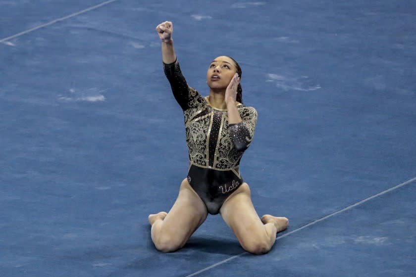 Westwood, CA, Saturday, February 27, 2021 - UCLA gymnast Margzetta Frazier flashes the "black power" sign.