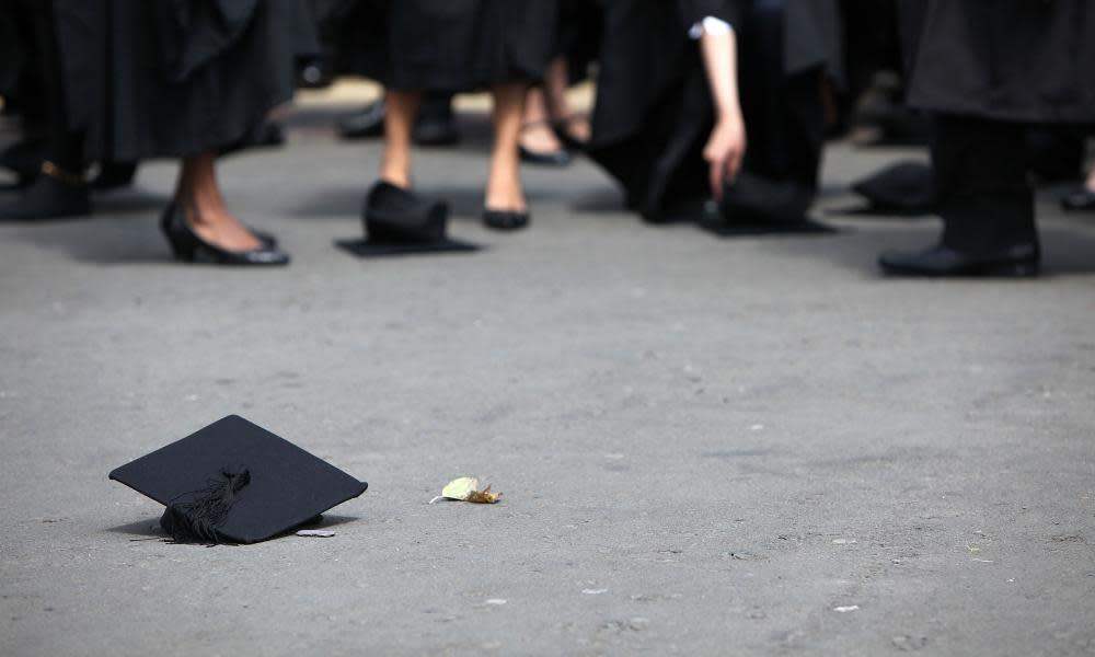 Mortarboard on floor