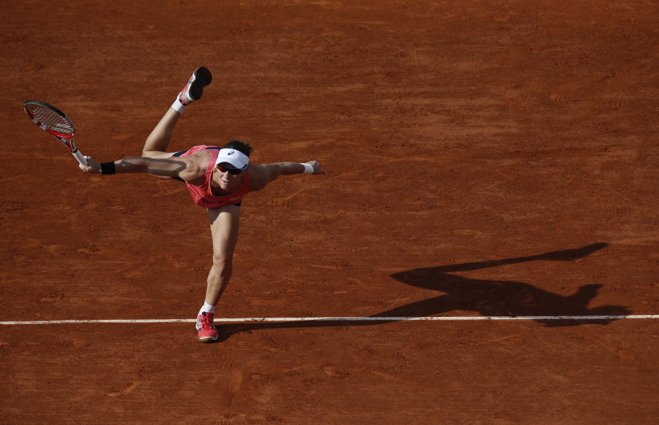 FILE - In this June 1, 2013, file photo, Australia's Samantha Stosur serves to Serbia's Jelena Jankovic during their third round match of the French Open tennis tournament at Roland Garros stadium in Paris. (AP Photo/Christophe Ena, File)