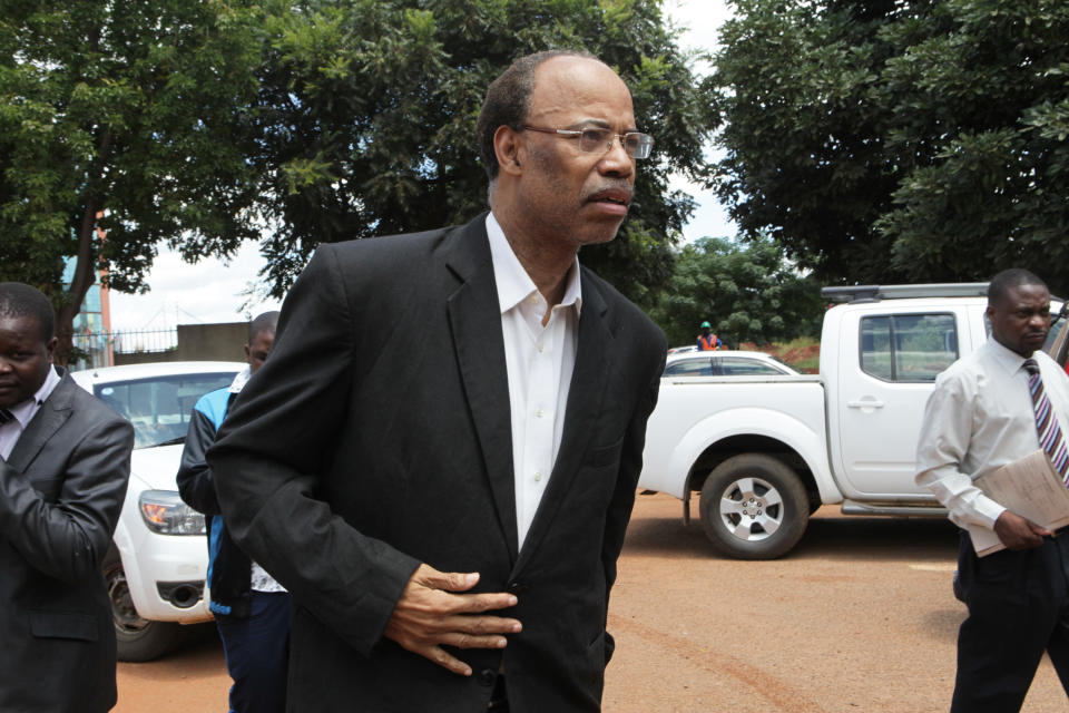 Former U S Congressman, Mel Reynolds, arrives to appear at the magistrates courts in Harare, Wednesday, Feb. 19, 2014. Reynolds was arrested in Zimbabwe for allegedly possessing pornographic material and violating immigration laws. (AP Photo/Tsvangirayi Mukwazhi)