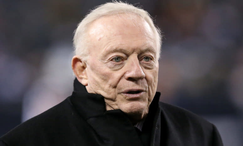 Jerry Jones walks onto the field before a Cowboys game.