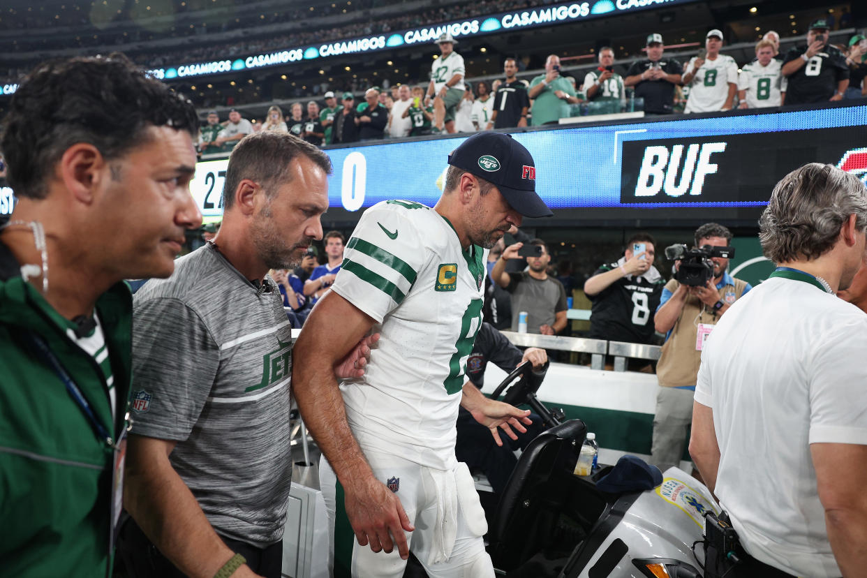 Aaron Rodgers was injured on the Jets' first series. (Elsa/Getty Images)